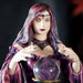 Closeup of sorceress' face with crystal ball