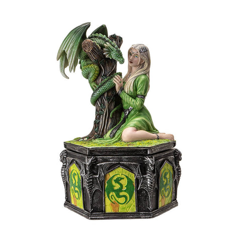 Trinket box with lid featuring blond woman in green dress with emerald dragon wrapped around tree trunk, and dragon designs around the base of the box.