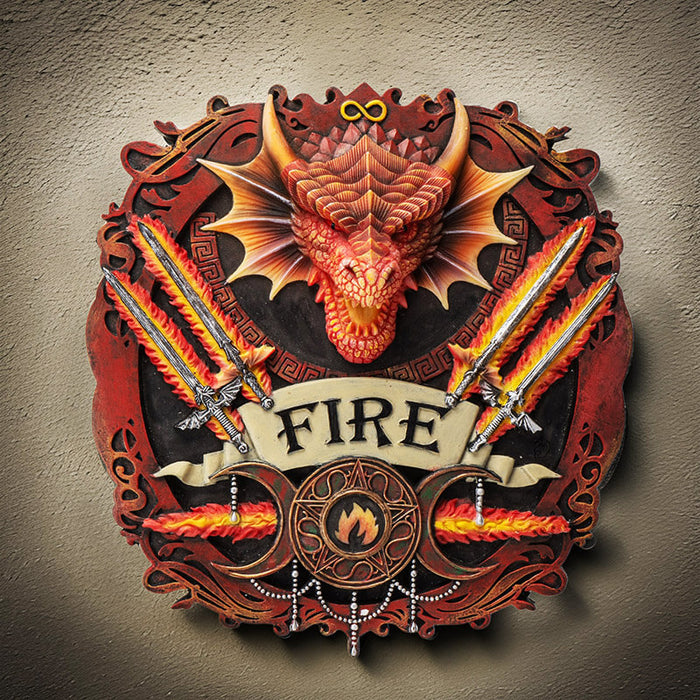Wall plaque with fire dragon head, flaming swords, and triple moon design