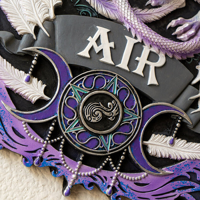 Closeup of "AIR" and triple moon in purple