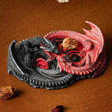 Incense burner with red and black dragons forming an infinity sign. Space for stick and cone incense.