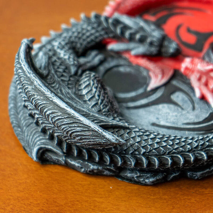 Closeup of black dragon with spot for cone incense.