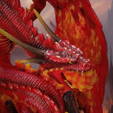 Closeup of red dragon breathing fire