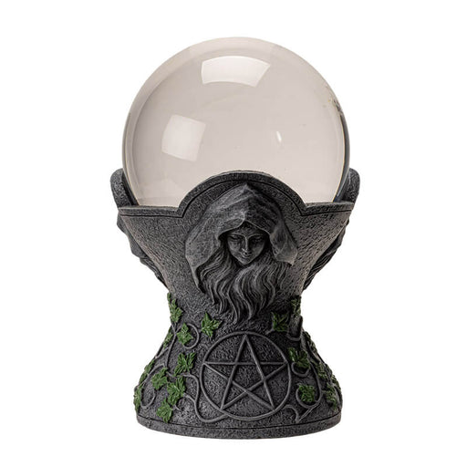 Crystal ball on a faux-stone stand with the maiden, mother & crone, leaf & pentacle designs