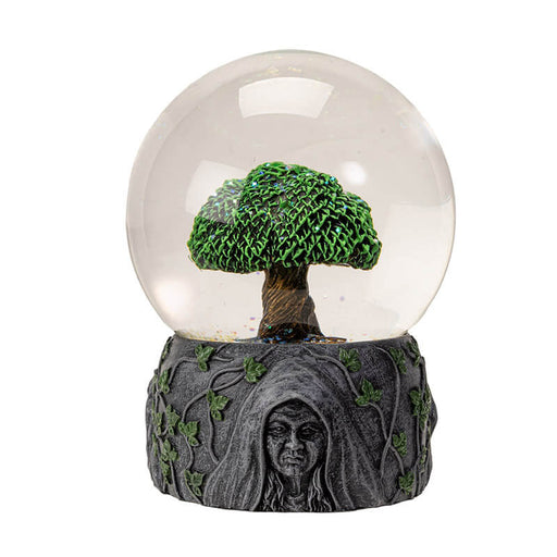 Snowglobe with a tree of life inside, and maiden, mother & crone Triple Goddess design around the faux-stone base.