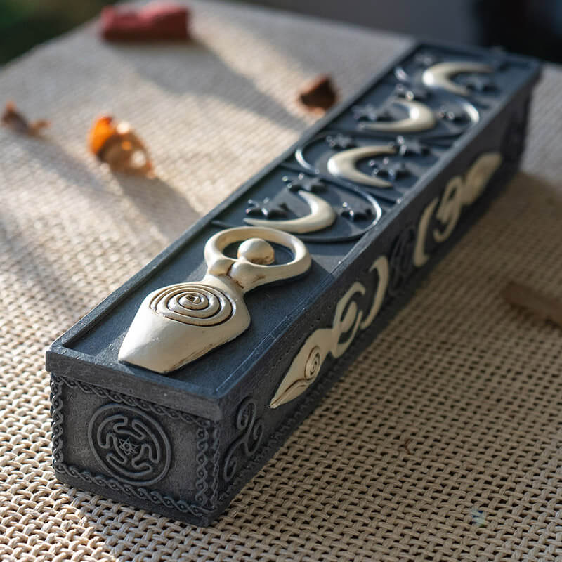 Incense burner box with cream-hued spiral goddess and crescent moons on faux-stone