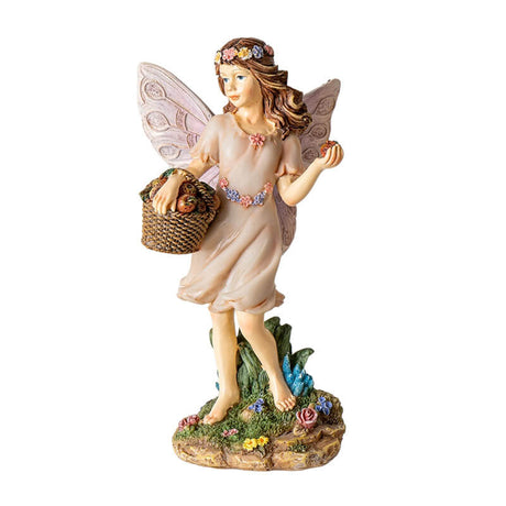 Fairy figurine of pixie with basket full of fruit, holding one. Brown hair, flower corn, pale pink dress & wings