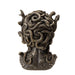 Backflow incense burner shaped like medusa's face with open mouth for smoke, snake hair. Done in faux-bronze. Back view