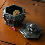 Faux stone grey trinket box with skulls on lid and around the sides