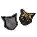 Trinket box shaped like a black cat head, orange eyes and gold triple moon designs. Shown top down, open