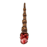 Magic wand with brown skull staff and faux red crystal topper