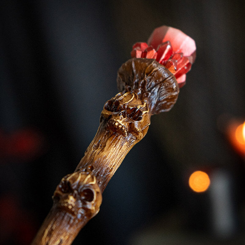 Magic wand with brown skull staff and faux red crystal topper