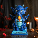 Figurine of a dragon sitting on a blue base that says "BE YOURSELF ALWAYS UNLESS OF COURSE YOU CAN BE A DRAGON!" The dragon is shades of blue with a little burst of fire.