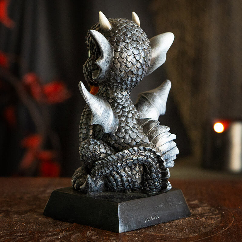 Figurine of a black dragon with flame and lady tattoo on a base that says "Dragon With Girl Tattoo."