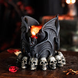 Holder featuring two vampire bats with red eyes, skull and Celtic knotwork base.