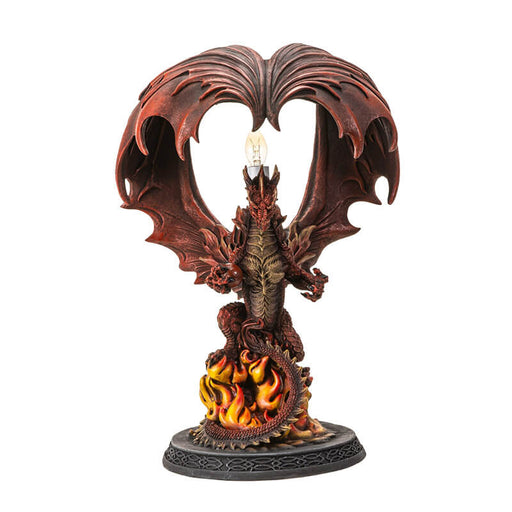 Corded lamp with red dragon with fire on a Celtic base, lightbulb in the back below curled wings.
