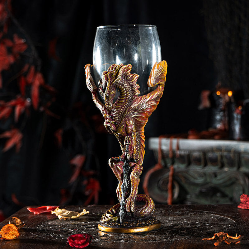 Goblet with glass at the top, fire dragon with sword forming the stem