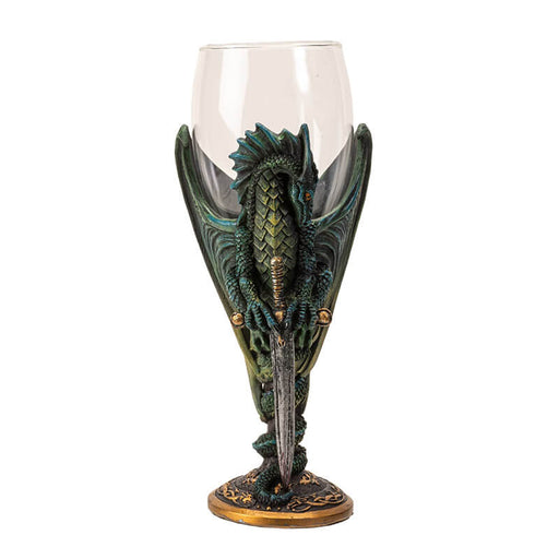 Glass topped goblet with green dragon and sword making up the stem