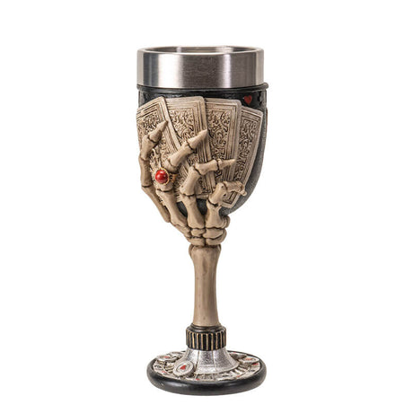 Goblet with stainless steel drinking insert. Skeletal hands hold four cards, showing both the backs and the aces on a poker-themed base.