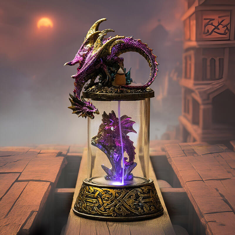 Backflow incense burner with dragon (gold & purple scales) perched on a capsule with a smaller dragon on crystals. LED illuminates incense smoke