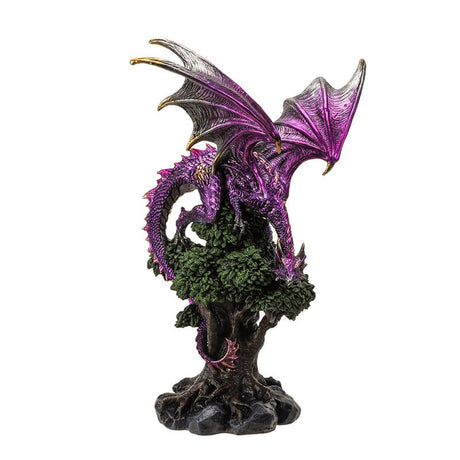 Figurine of a metallic purple dragon perched on a green tree