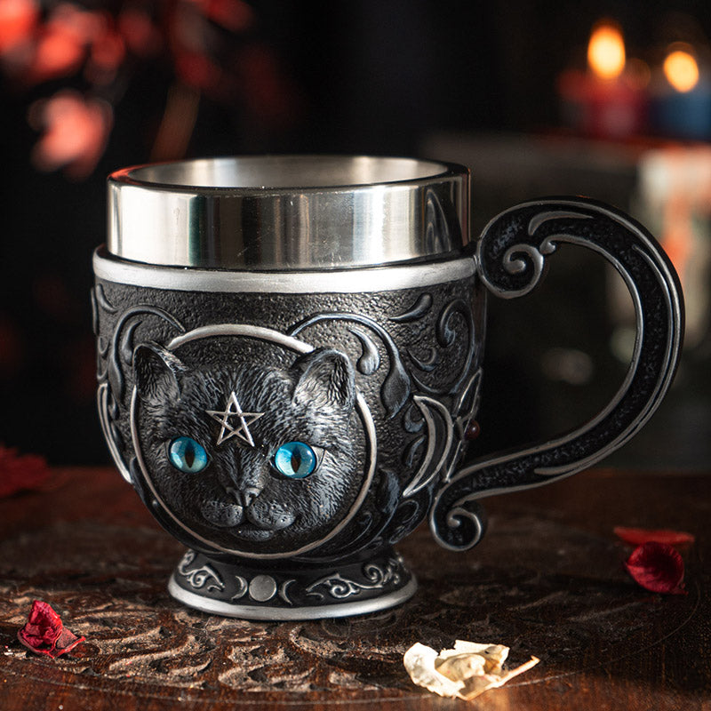 Teacup with black cat with blue eyes, pentacles, moons. Stainless steel insert.