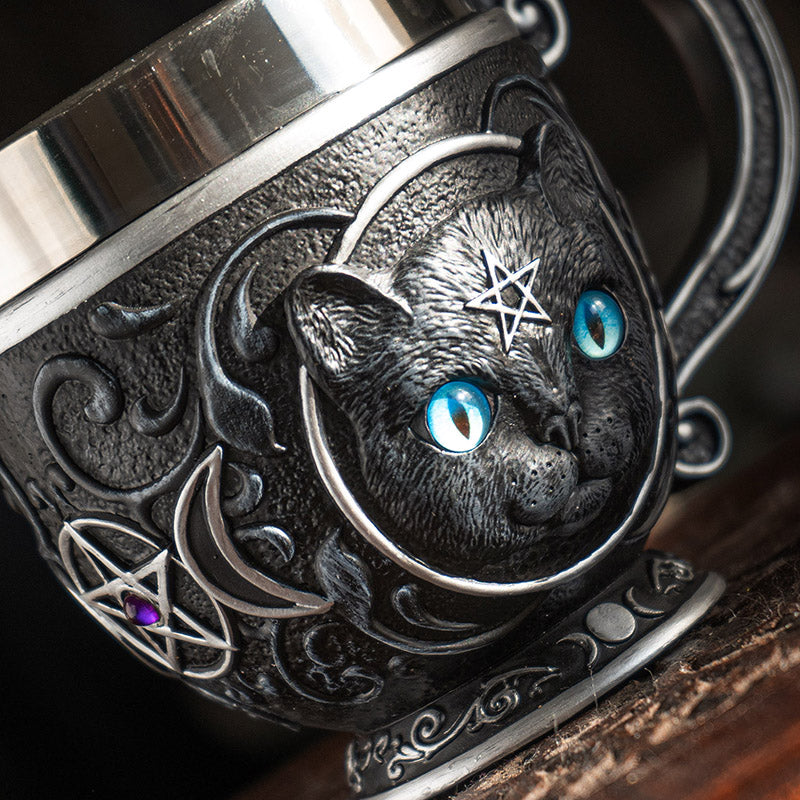 Teacup with black cat with blue eyes, pentacles, moons. Stainless steel insert.