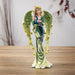 Figurine of a fairy with green wings and flowers, holding a peacock - small version