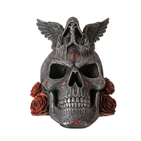 Skull figurine with Grim Reaper on top, red accents, roses