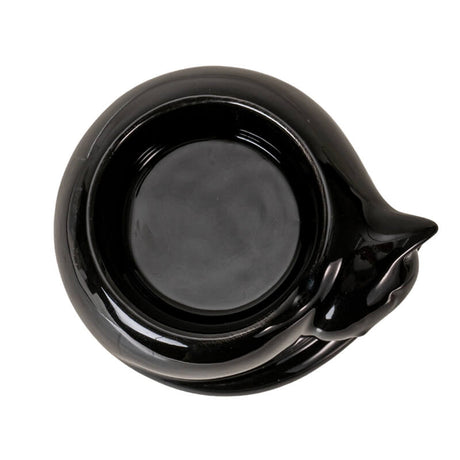 Black ceramic curled up cat tealight candle holder, shown top down