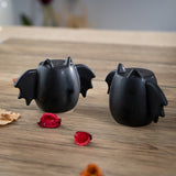 Black ceramic bat shaped salt & pepper shakers