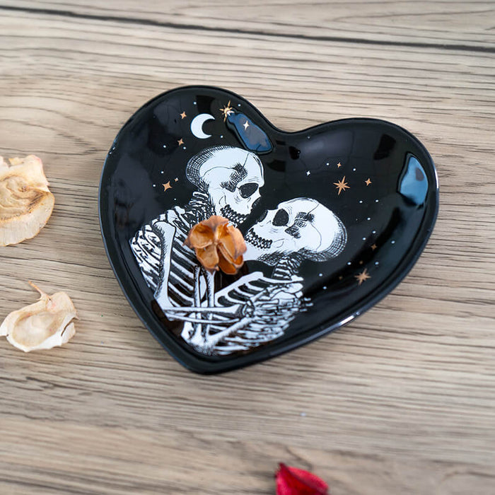 Black ceramic trinket dish with two skeletons, moon and stars