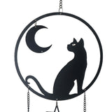 Black metal wind chime with cat gazing at crescent moon, dangling bells and pentacle