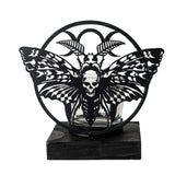 Black metal tea light holder with death head moth