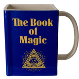 Square coffee mug, blue, "The Book of Magic" with all seeing eye