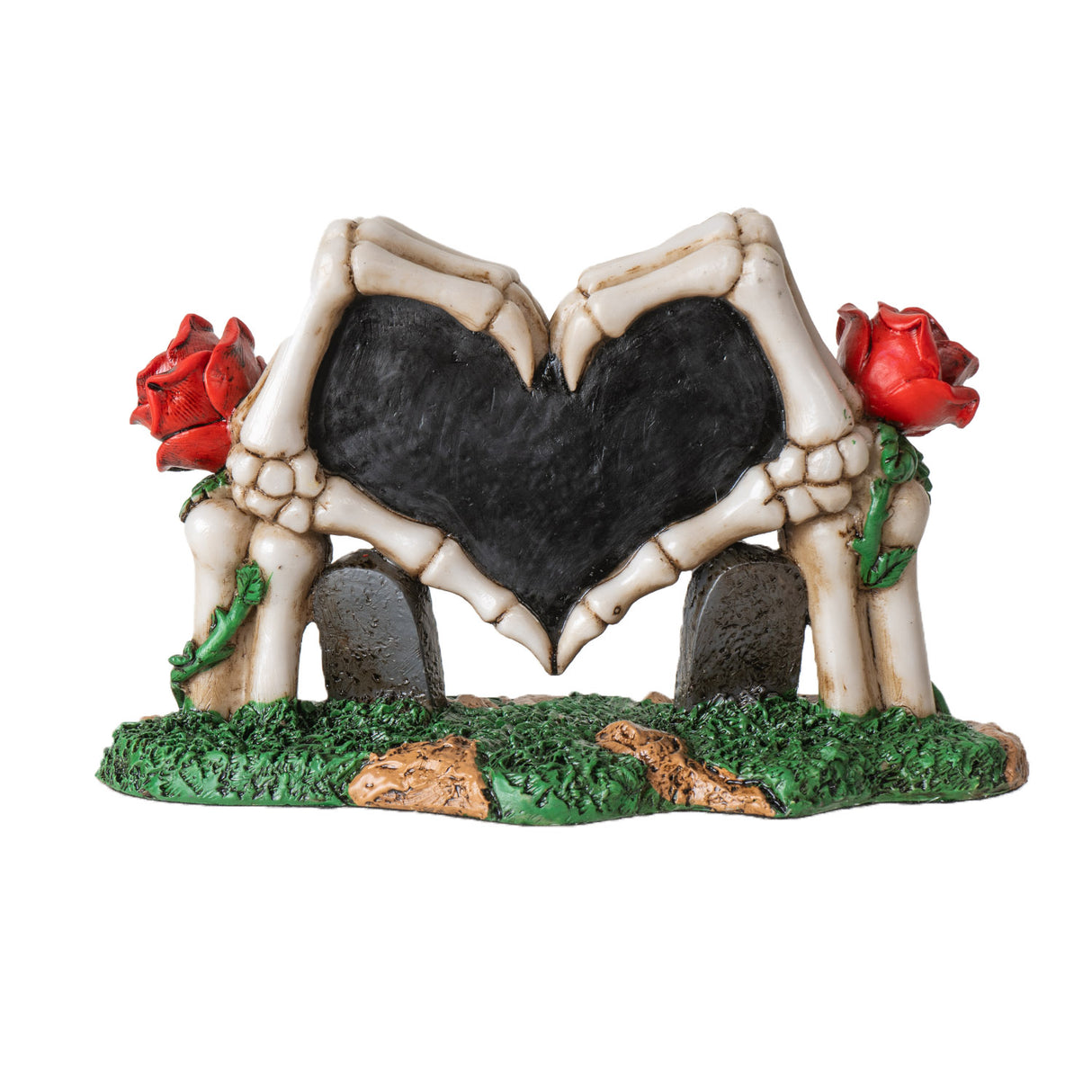 Figurine of skeleton hands forming heart with roses and gravestones