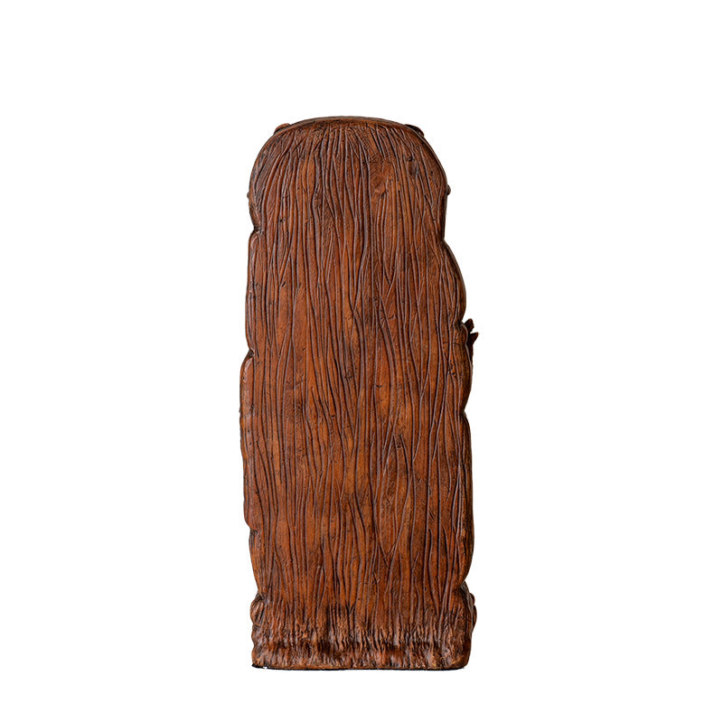 Back of the figurine, faux woodgrain