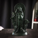 Mother Earth (Gaia) figurine in dark green faux-stone, pregnant goddess standing with owl, stag, fox, raven, hare and bear and sun behind her head, earth continents on her stomach