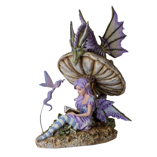 Figurine based on Amy Brown art, fairy sitting under mushroom reading to a magic spirit and a dragon