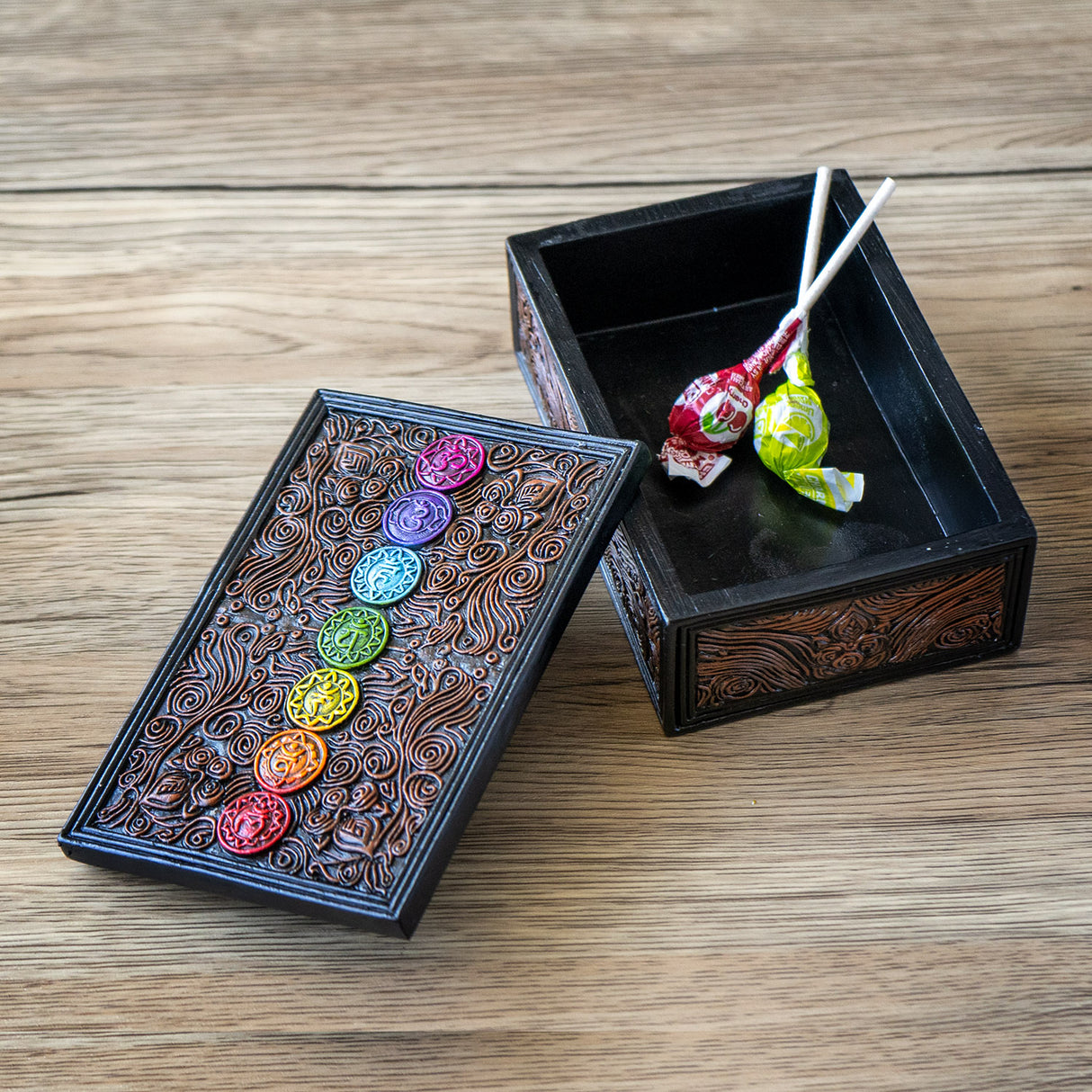 Tarot sized trinket box, 7 chakra symbols in rainbow on a brown and black swirl pattered lid