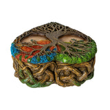 Trinket box with tree of light design, colorful leaves on the lid and intertwining roots and branches