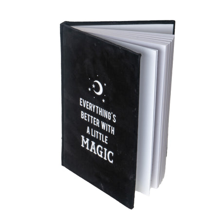 Black velvet journal with silver writing on cover: "Everything's better with a little magic"