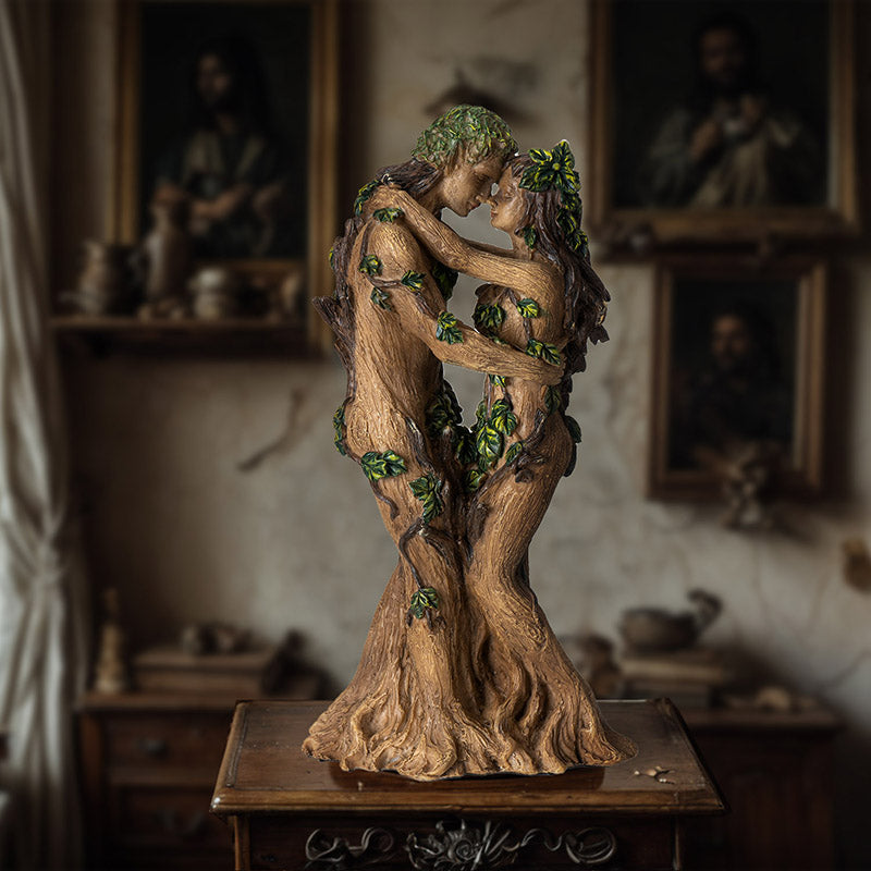 Figurine of two ents embracing, tree people with vines