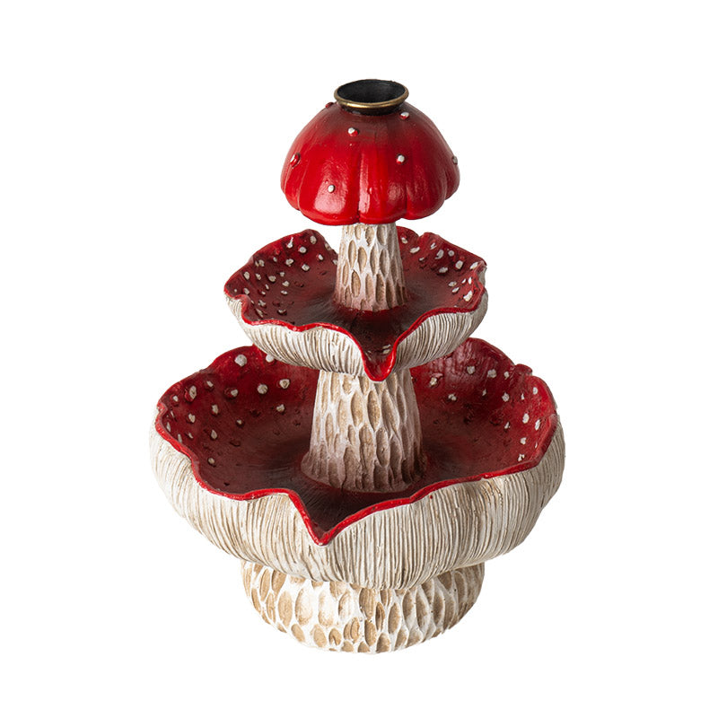 Backflow incense burner featuring three tiered red and white mushroom