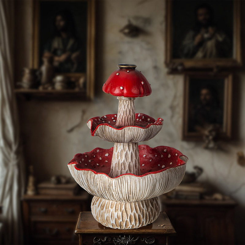 Backflow incense burner featuring three tiered red and white mushroom