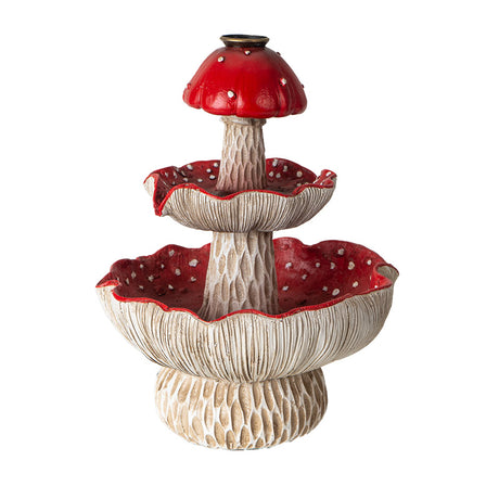 Backflow incense burner featuring three tiered red and white mushroom