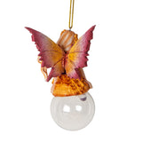 Hanging fairy ornament, pale pixie with red, orange and purple color scheme and striped stockings, perched on glass bubble