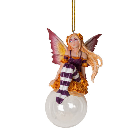 Hanging fairy ornament, pale pixie with red, orange and purple color scheme and striped stockings, perched on glass bubble