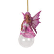 Hanging fairy ornament, dressed in pink with rose and white stockings, speckled pink wings, tan skin, perched on glass bubble