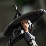 Close up, witch in big hat with raven perched on top